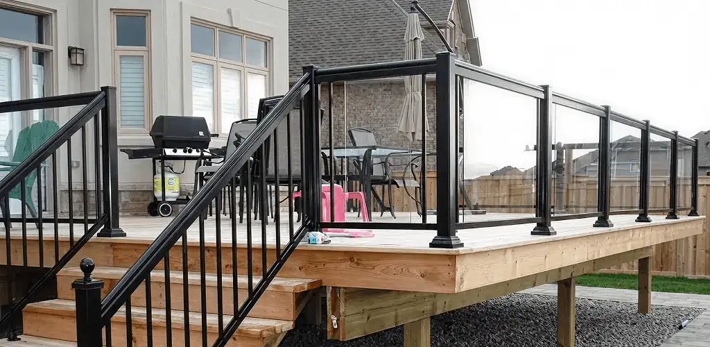 Handrail installation on a deck staircase for safety and code compliance in Shreveport, LA