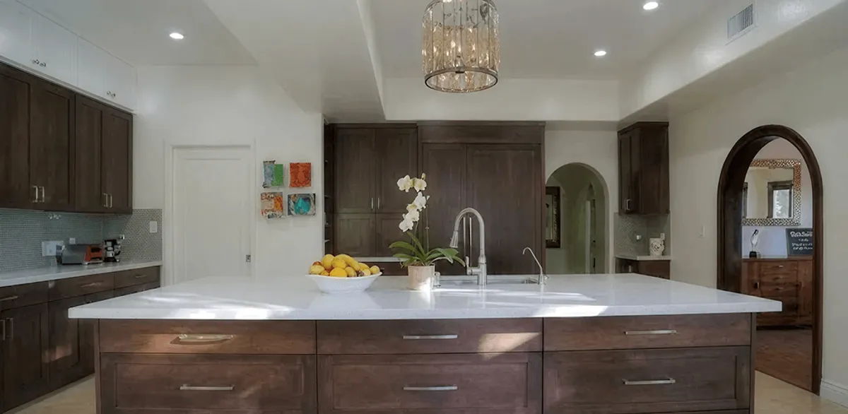 Cabinet refacing project with updated kitchen cabinets and island in Shreveport, LA