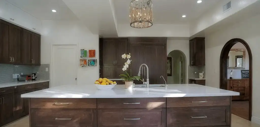 Cabinet refacing project with updated kitchen cabinets and island in Shreveport, LA